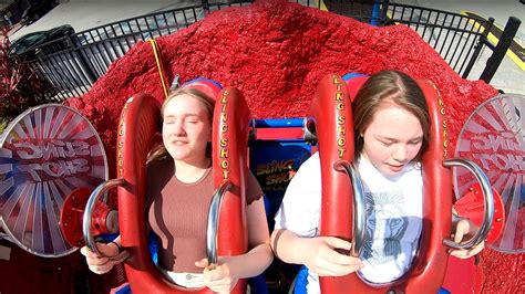 Thrill-Seekers Unite: Conquering the Midway Sling Shot Ride